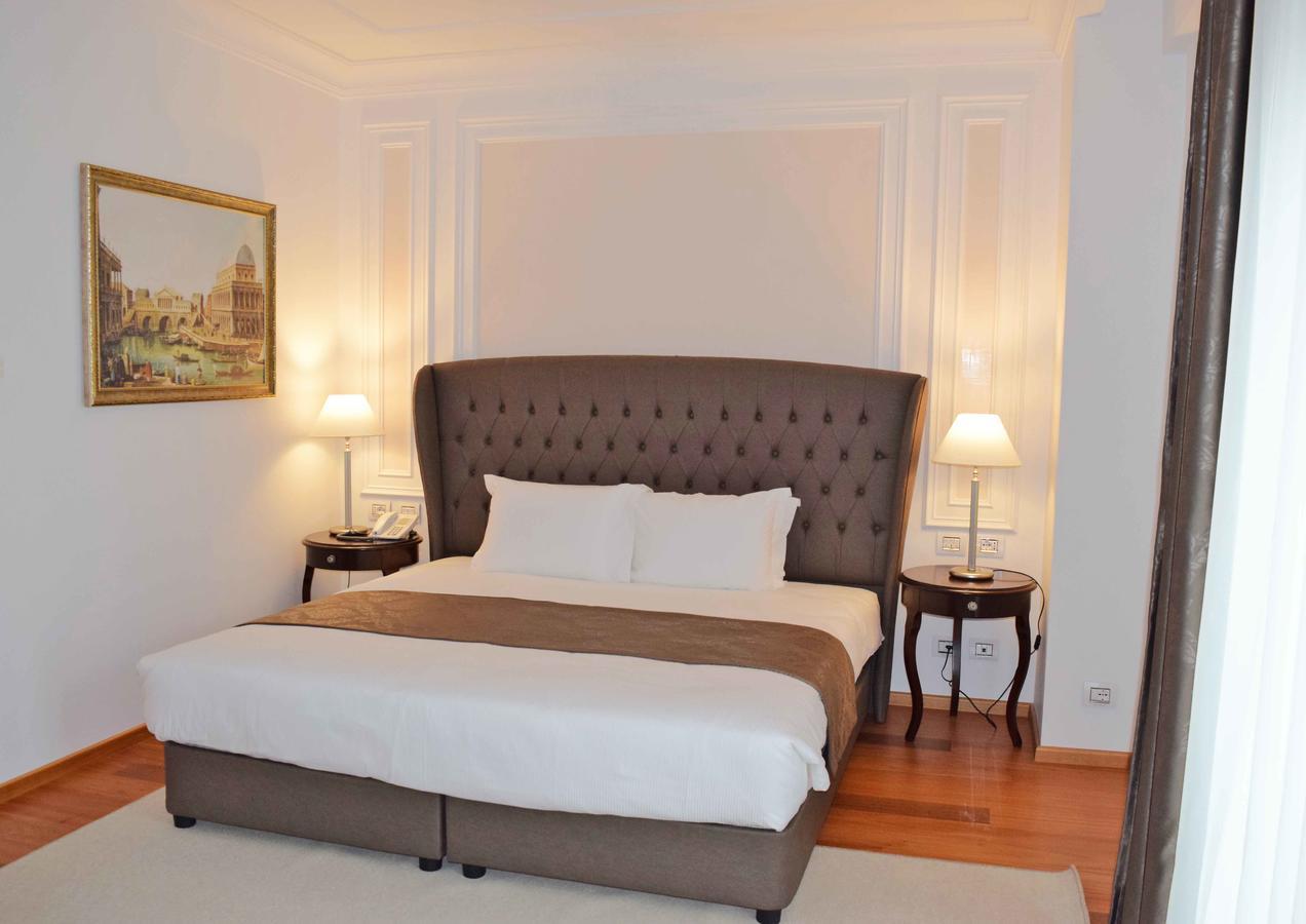Xheko Imperial Luxury Hotel & Spa ติรานา ภายนอก รูปภาพ A bedroom at the hotel