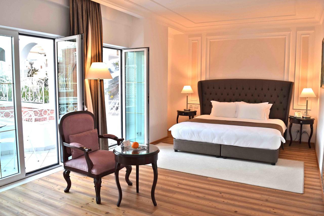 Xheko Imperial Luxury Hotel & Spa ติรานา ภายนอก รูปภาพ A bedroom at the hotel