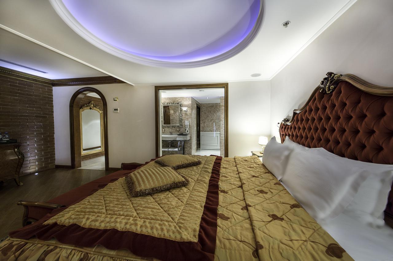 Xheko Imperial Luxury Hotel & Spa ติรานา ภายนอก รูปภาพ A room at the hotel